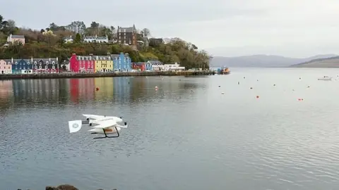 Royal Mail Drone with parcel flying over Mull