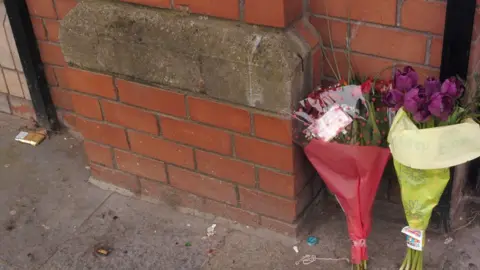 PAcemaker Flowers left at the scene outside Magennis's Pub in Belfast after the fatal stabbing of local man Robert McCartney.