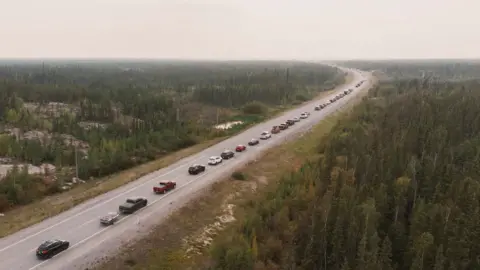 Reuters Cars on Highway 3 out of Yellowknife