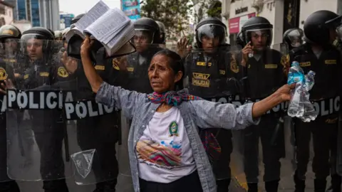 A protester in Lima