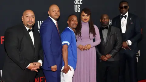 Getty Images The Central Park Five with series director Ava DuVernay