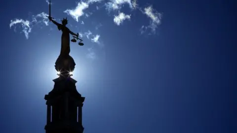 Getty Creative The statue of Lady Justice on top of the Old Bailey