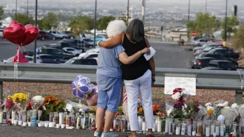 EPA Mourners in El Paso Texas after a shooting there which killed 22 people