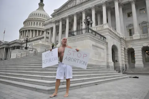 Getty Images Protester outside court