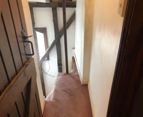 Lofty Heights The staircase after the cobwebs were cleared