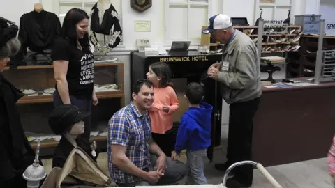 Chris Stead/Courtesy Stephen Mills Stephen Mills (centre) with the safe he had just opened