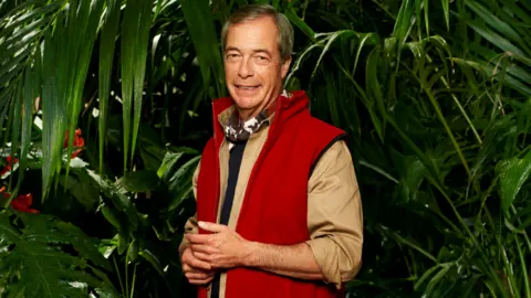 ITV/Shutterstock Nigel Farage in the I'm A Celebrity jungle