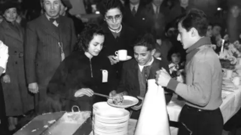 Getty Images The first destination for many new arrivals was Dovercourt Bay holiday camp, near Harwich, where they enjoyed their first meal