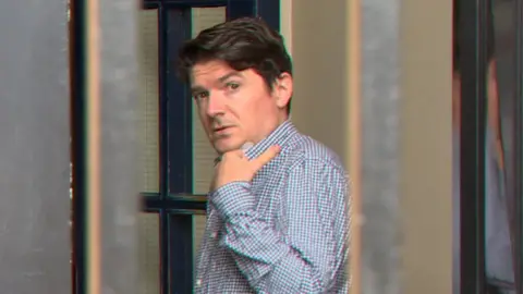 BBC Picture of Michael McMonagle about to leave court