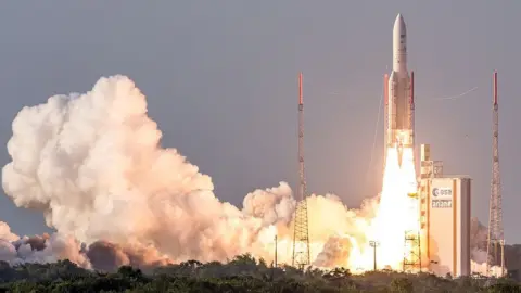 Getty Images A rocket carrying the NBN's first satellite is launched into space from French Guiana in 2015