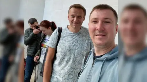 Ilya Ageev Ilya Ageev with Alexei Navalny before the flight