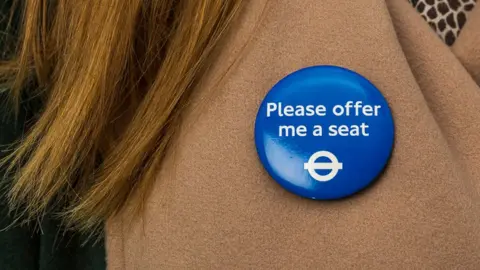 Transport for London Please off me a seat badge