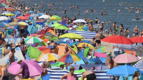 Getty Images German beachgoers during a heatwave in 2019