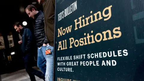 Getty Images a hiring sign in the US