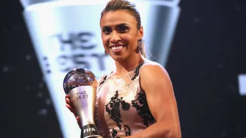 Getty Images Marta picking up her latest award