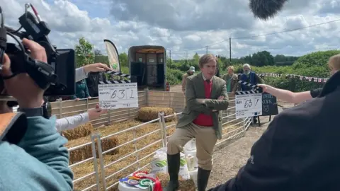 Baby Cow Filming at a rural setting with Alan Partridge