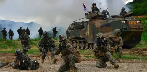 Getty Images US and South Korean troops conduct training drills in South Korea (file image)