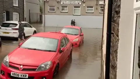 Wales news service Pentre has been struck by flooding following rain on Wednesday