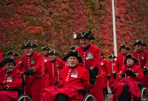 Victoria Jones / PA Media Chelsea Pensioners at the Saluting Base in Horse Guards during the Remembrance Sunday service at the Cenotaph, in Whitehall, 12 November 2023