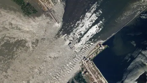 Planet Lab PBC A satellite image shows the water flooding from the Kakhovka dam