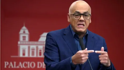 Reuters Jorge Rodríguez speaking at Miraflores Palace on 12 March 2019