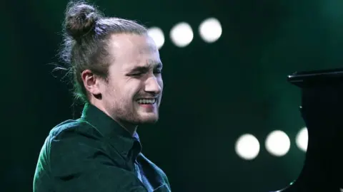 Fergus McCreadie performs at the Mercury Prize ceremony