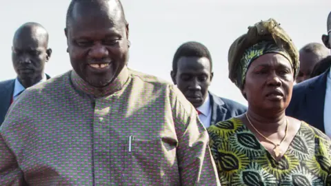 AFP Riek Machar and his wife Angelina Teny