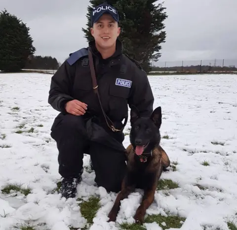 Essex Police Baloo with her handler PC Ross Ashcroft