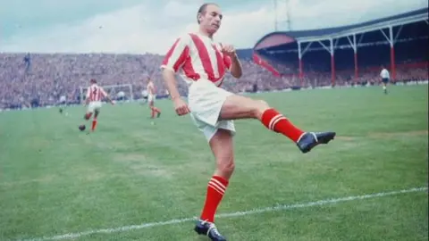 PA Media Sir Stanley Matthews playing for Stoke City