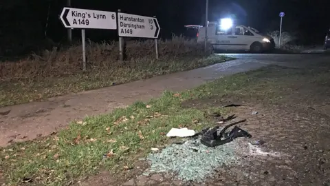 Sam Russell/PA Crash scene debris