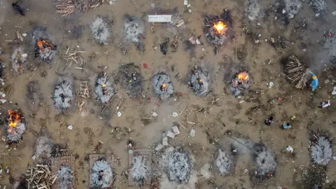 Reuters Funeral pyres in Delhi, India