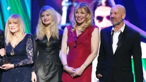 Getty Images Michael Stipe, Wendy O'Connor, Frances Bean Cobain and Courtney Love