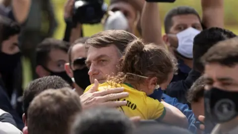 EPA Brazilian president Jair Bolsonaro meets supporters during a demonstration, in Brasilia, Brazil, 24 May 2020.