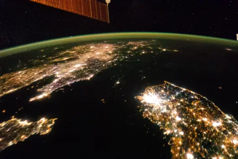 NASA The Korean peninsula seen from the International Space Station in 2014 - Pyongyang is a speck of light in the darkness of North Korea