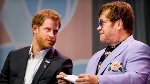 Getty Images Prince Harry and Elton John