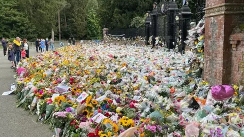 Kate Scotter/BBC Flowers outside Sandringham