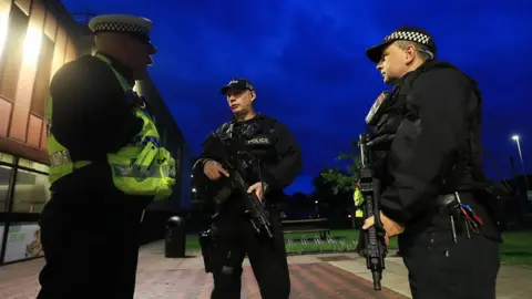 PA Police outside Kendal Leisure Centre where General Election ballot papers for the Westmorland and Lonsdale constituency are being counted