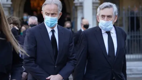 PA Media Former prime ministers Tony Blair (left) and Gordon Brown leave the funeral service of Labour MP Jack Dromey at St Margaret's Church in Westminster