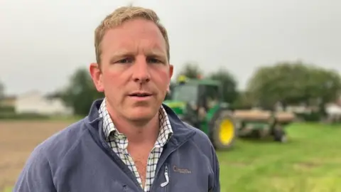 Shaun Peel/BBC Farmer Tom Mead