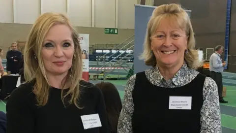 Manchester Credit Union Christine Moore and a colleague
