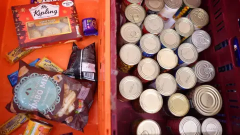 Getty Images Donations at a typical food bank in the UK