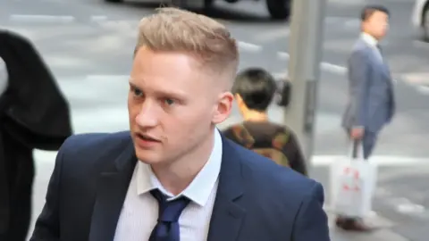 PA Sam Oliver outside court in Sydney