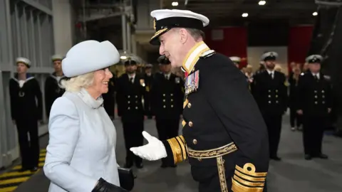 PA Media Admiral Radakin greets the Duchess of Cornwall
