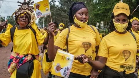 Getty Images Supporters of Ugandan President Yoweri Museveni are seen during a rally in Jinja, Uganda, on 4 December 2020