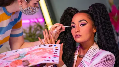 PA Media Artist paints Leigh-Anne figure