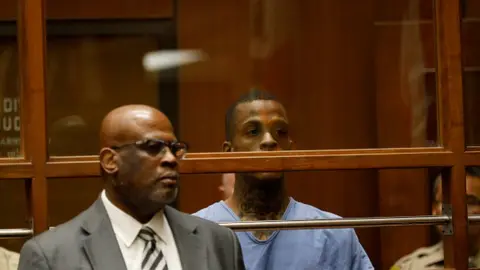 Getty Images Chris Darden and Eric Holder