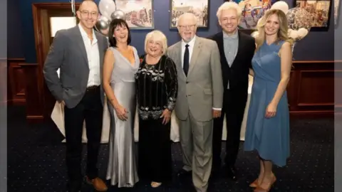 Family photo Irene and Meyrick Sheen (centre) with their daughter Joanne Sheen and her husband Dave Cartwright (left), son Michael and his partner Anna Lundberg