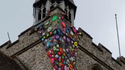 Flowers being put on a church