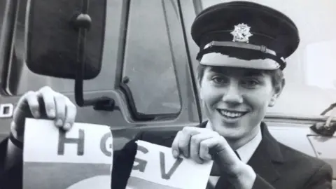 BBC Josephine tearing up her HGV L-plates after qualifying to drive fire engines