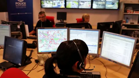 PA Media Officers at work in a control room